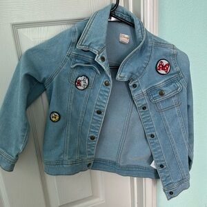 Disney Girls Jean jacket size 7/8. It’s used but in good condition.